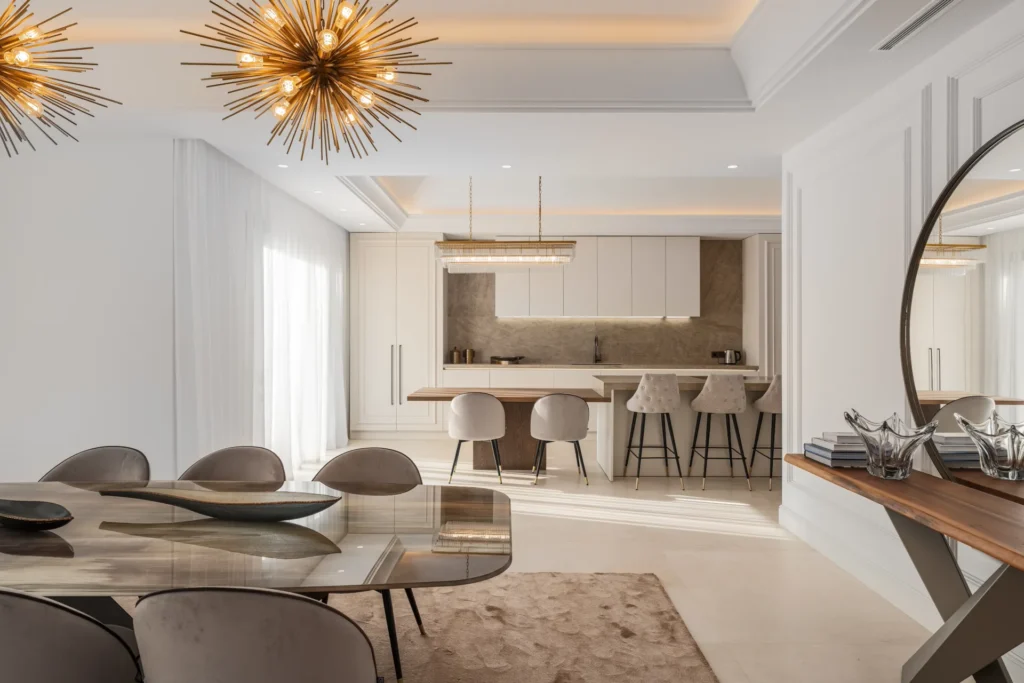 Open living · Golden spike chandeliers · Stone island. A space that breathes both classic elegance and contemporary glamour. The virtual staging captured every reflective surface and sunbeam.